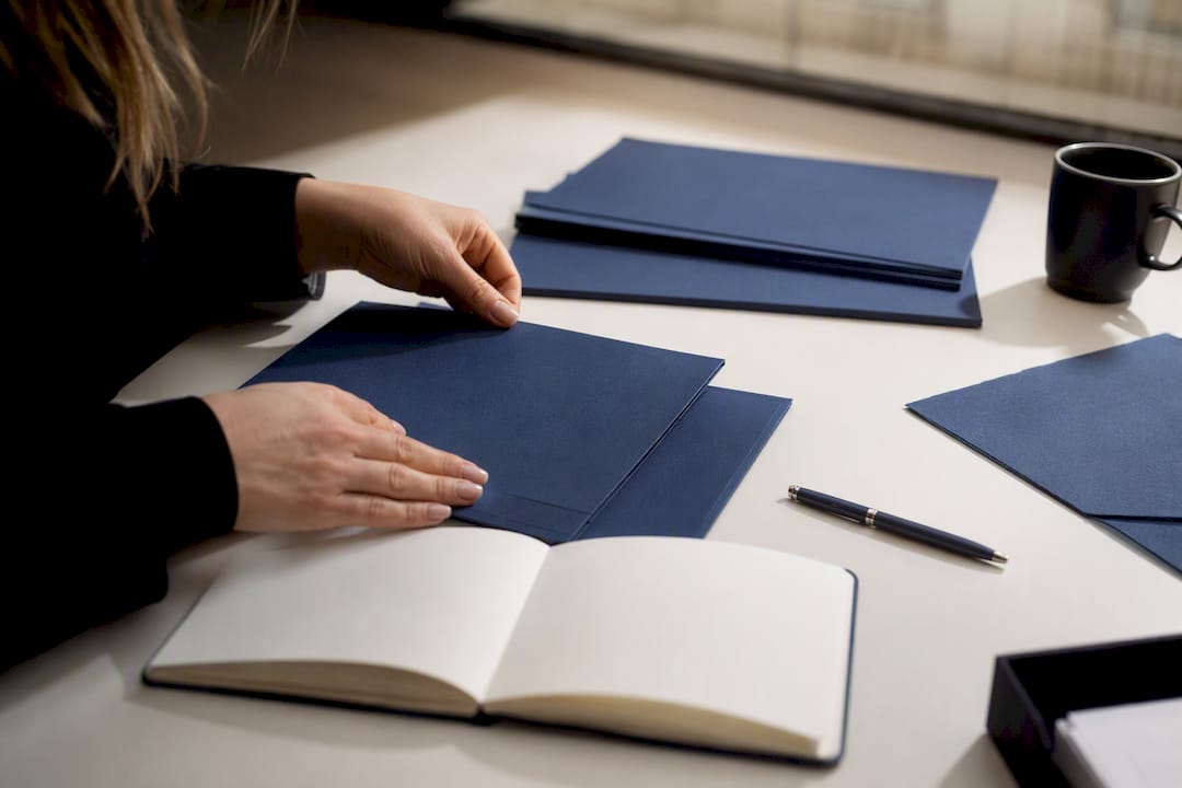 Hands assembling personalized marketing content