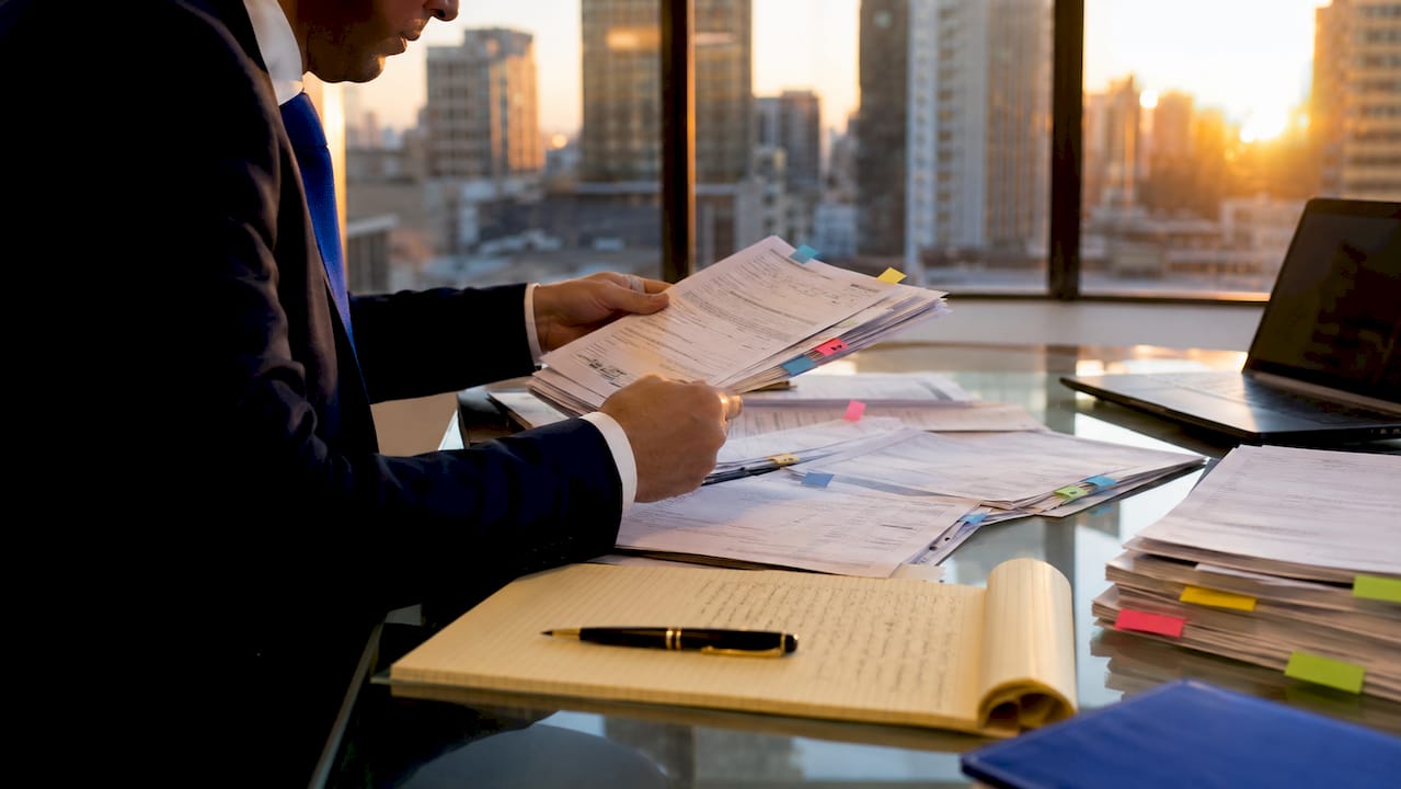Lawyer reviewing legal documents on medical negligence