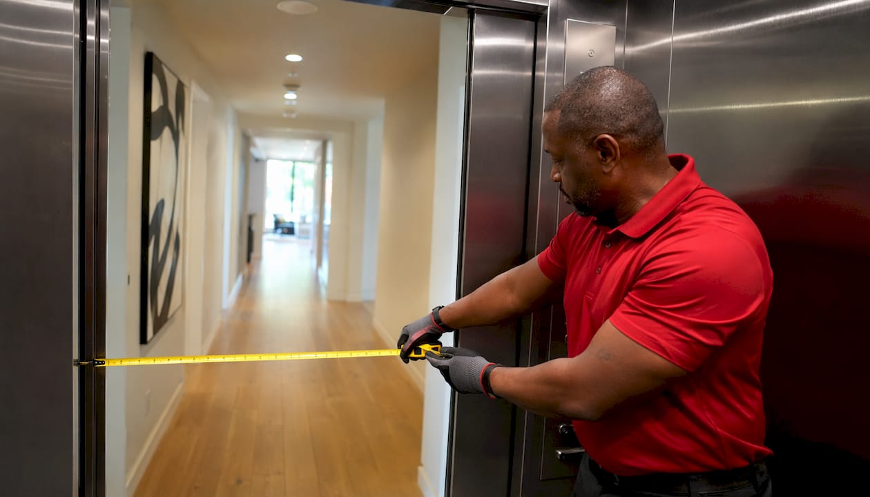 Mover measuring condo elevator interior dimensions