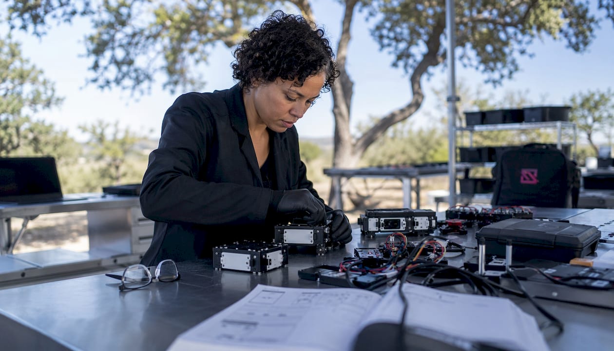 Engineer assembling modular sensor components