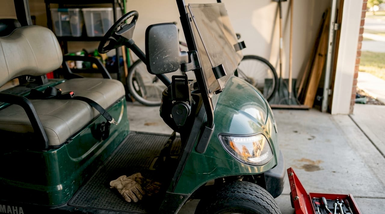 Golf cart with installed safety accessories