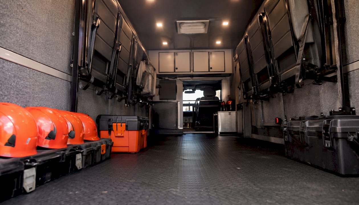 Fold-up jump seats folded up inside work truck