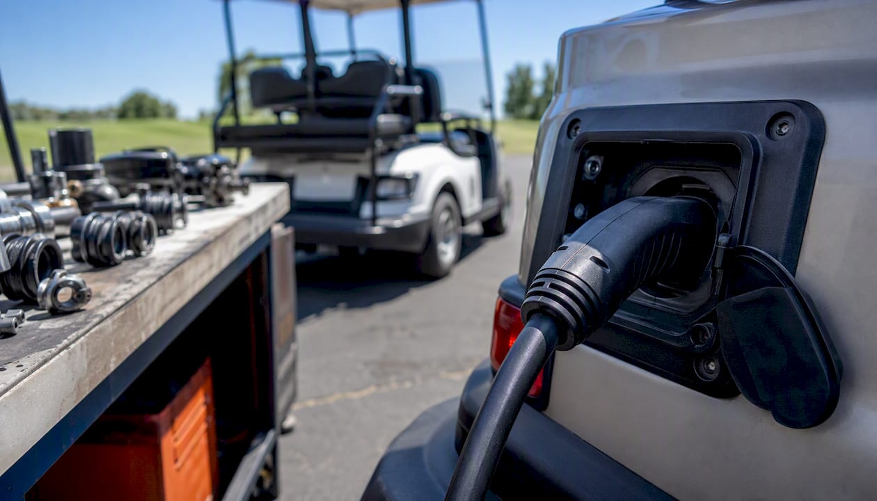 EV charging cable connected to port