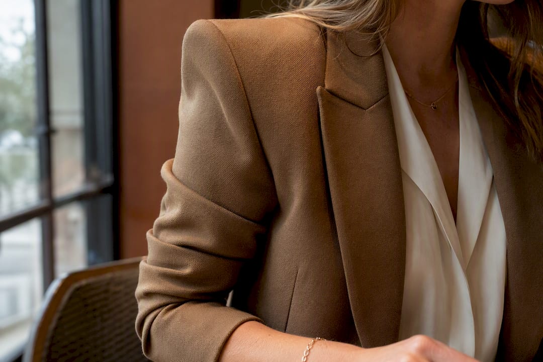 Close-up on structured blazer sleeve detail