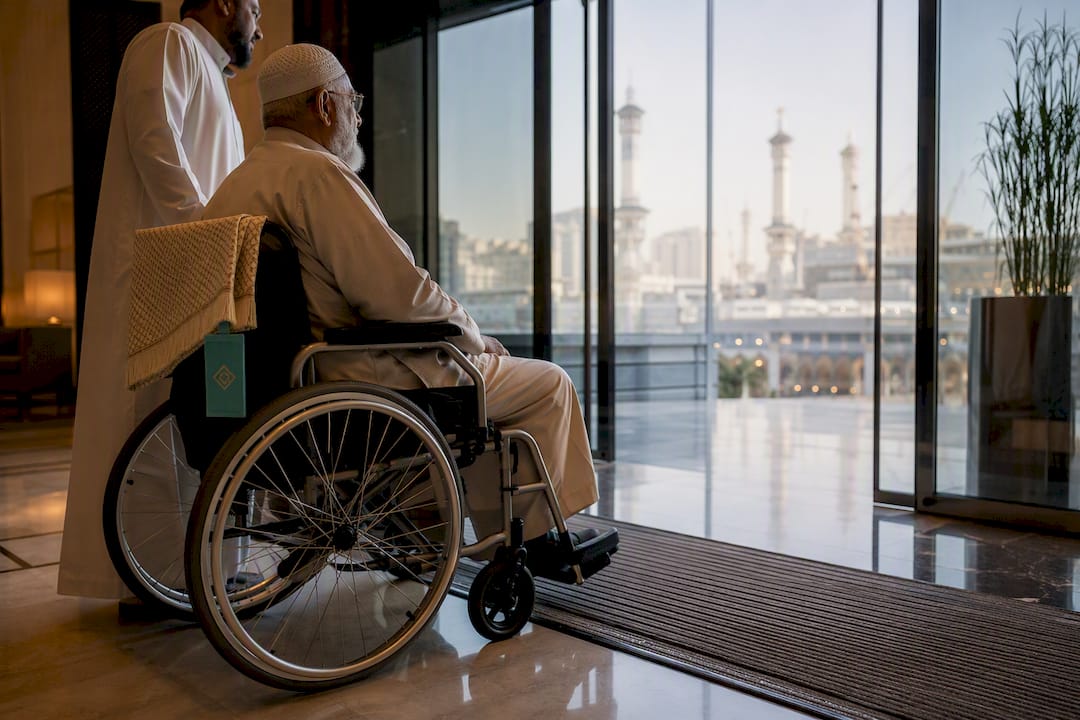 Elderly parent using wheelchair near hotel entrance