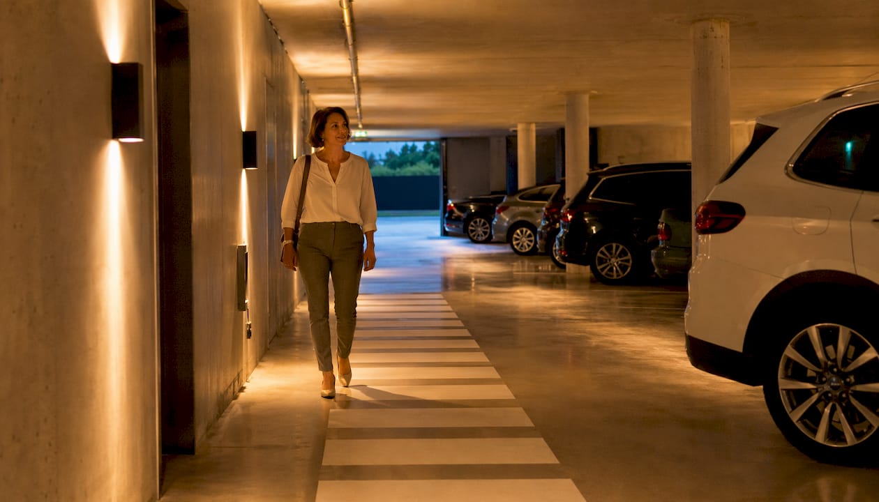 Woman walking in underground parking garage