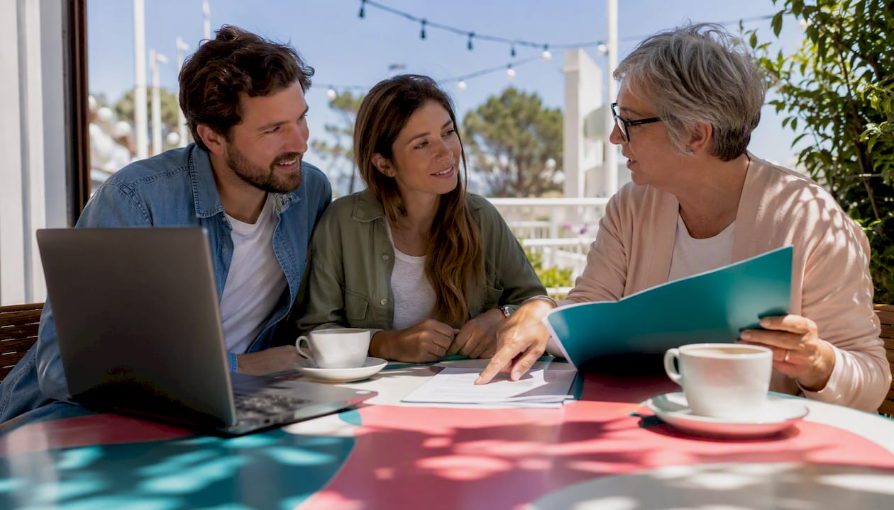Notary explaining document checklist to clients