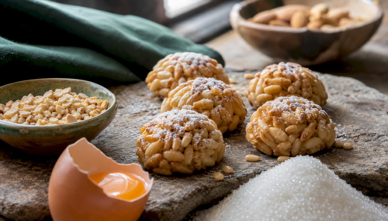 Close-up of authentic panellets with baking ingredients