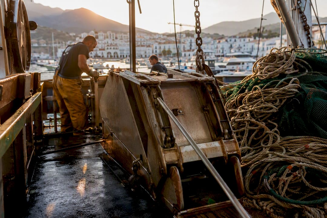 Fishing boat preparing selective trawling gear