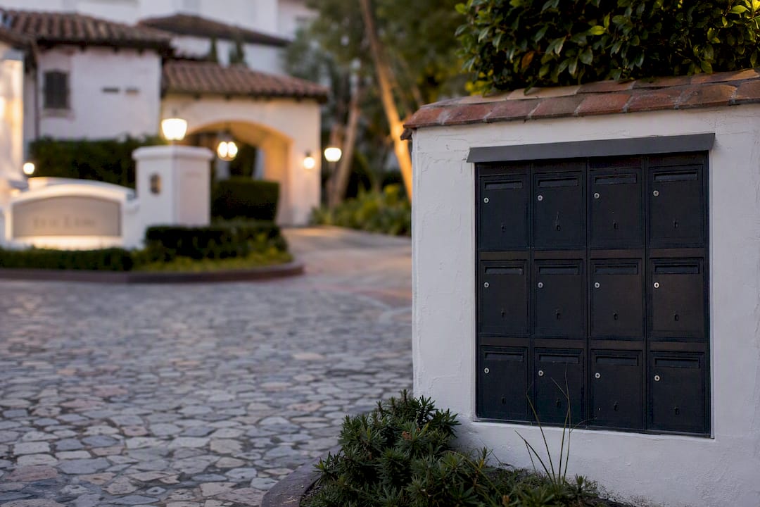 Spanish residential community entrance mailboxes