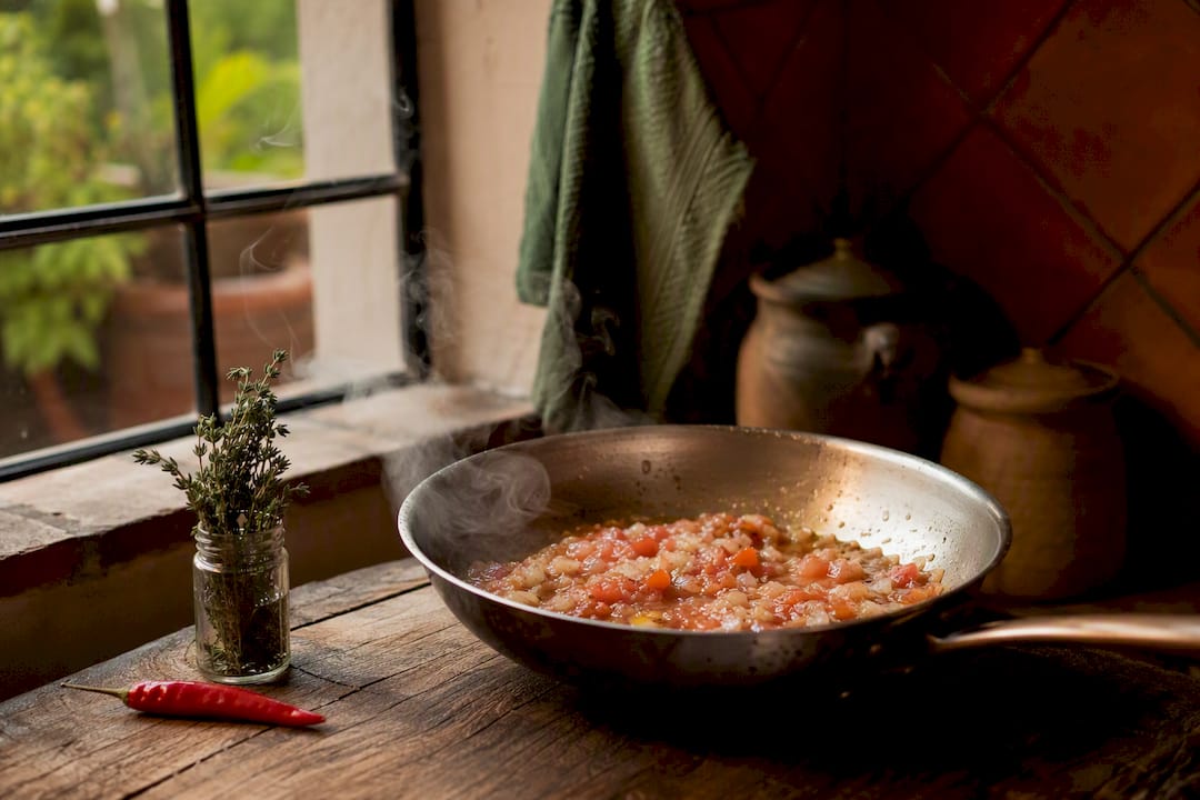 Sofrito cooking in pan for mejillones sauce