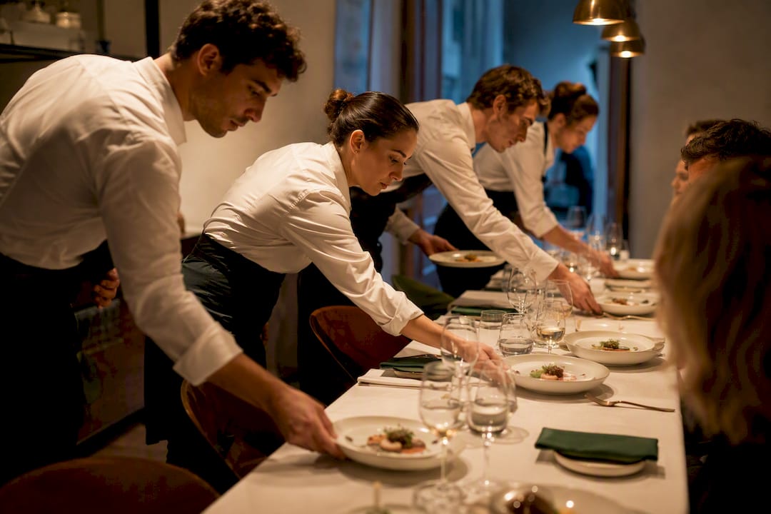 Staff coordinating courses for private dinner