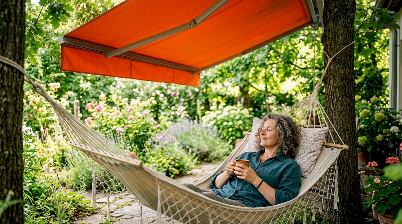 Woman relaxing under modern veranda in garden