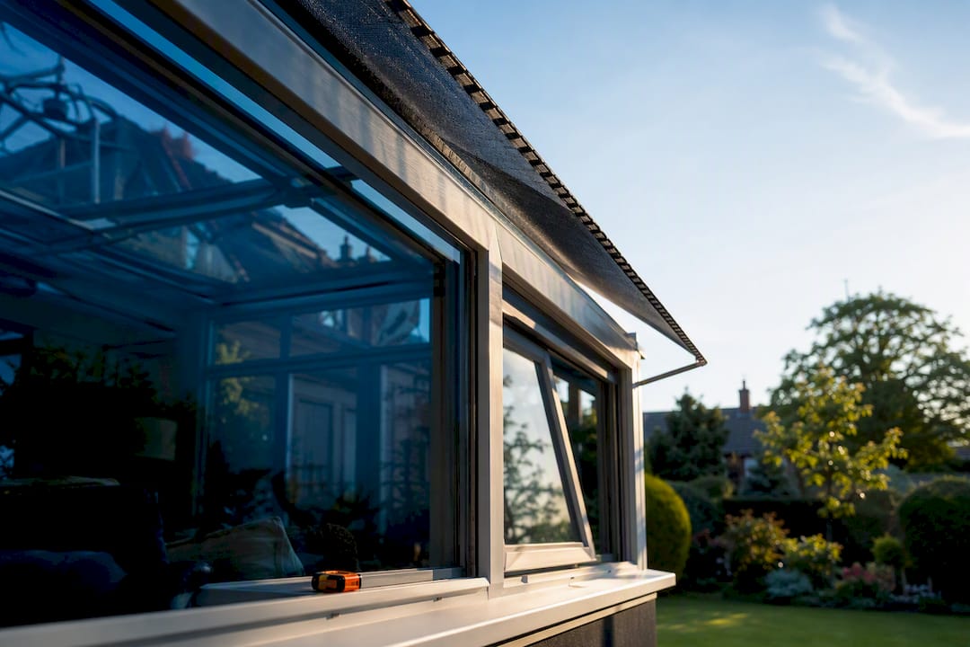 Sunlit conservatory with external roof shading