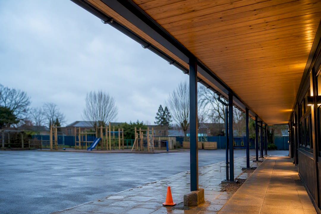 School canopy viewed from playground edge
