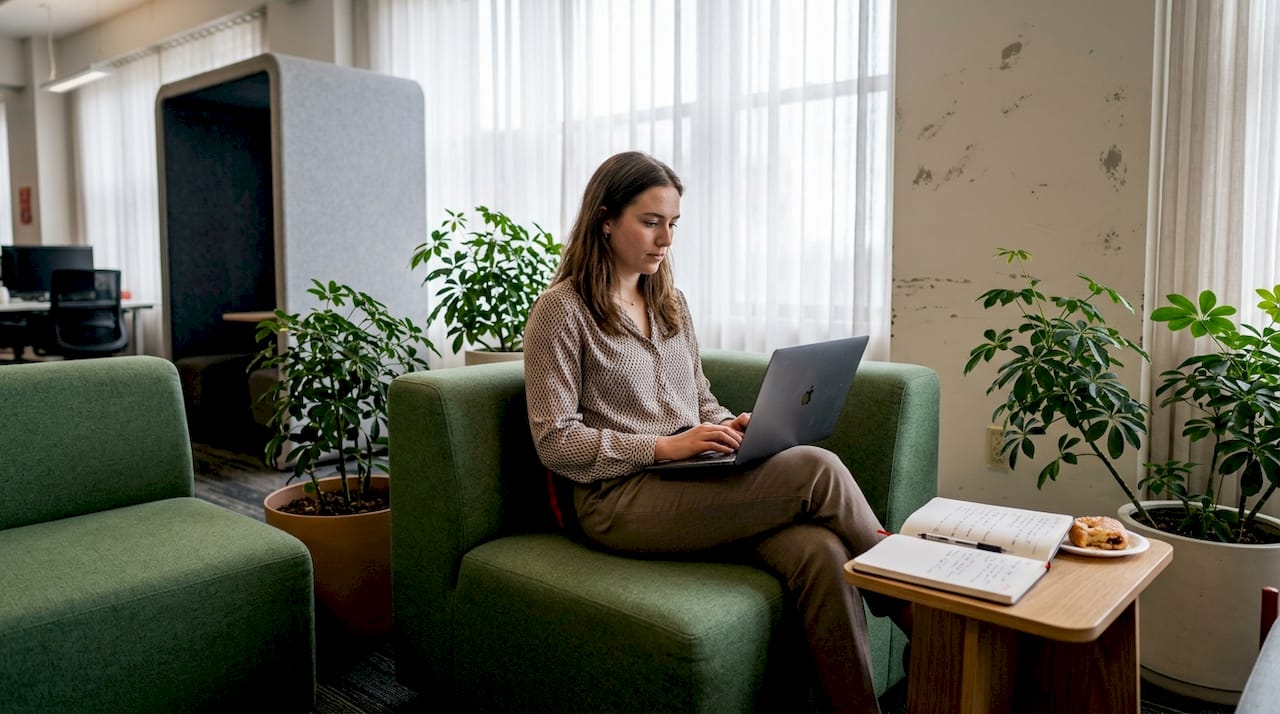 Employee in biophilic flexible Illinois office zone