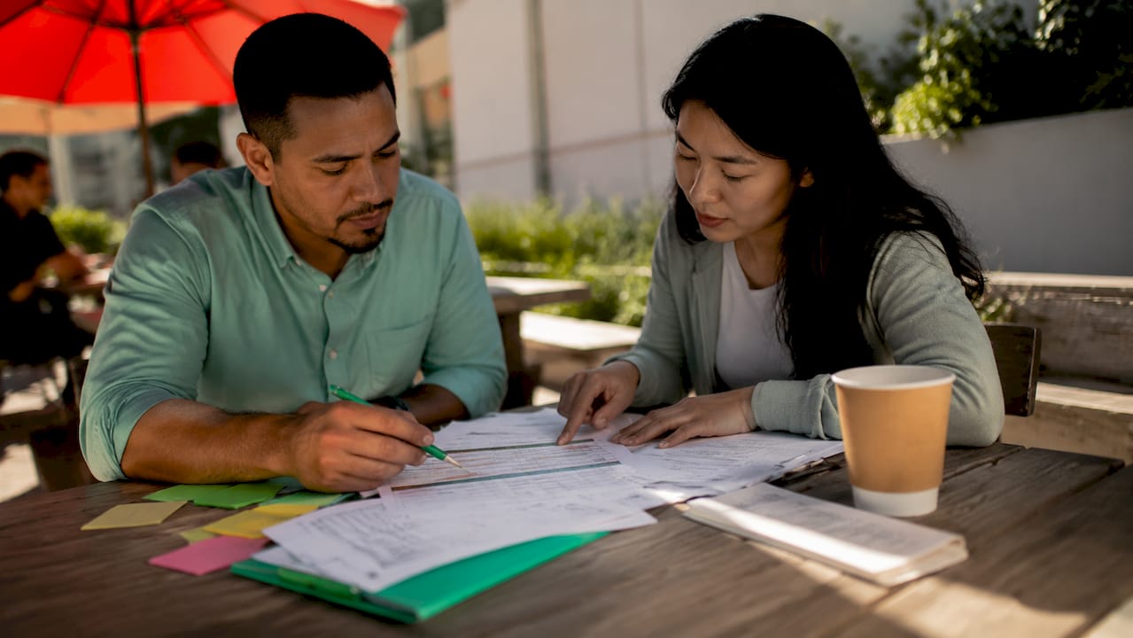 Healthcare workers reviewing post-acute care referrals