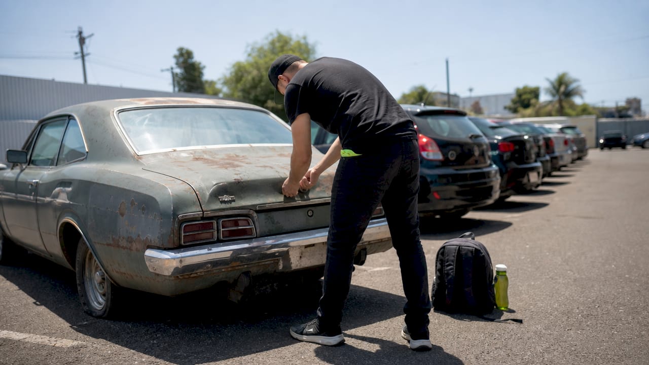 Preparing junk car for pickup in Calgary