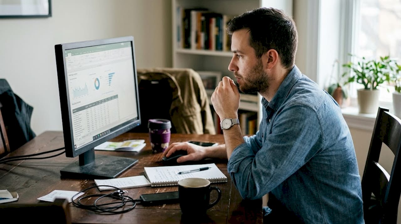 Marketer analyzing AI workflow data at home