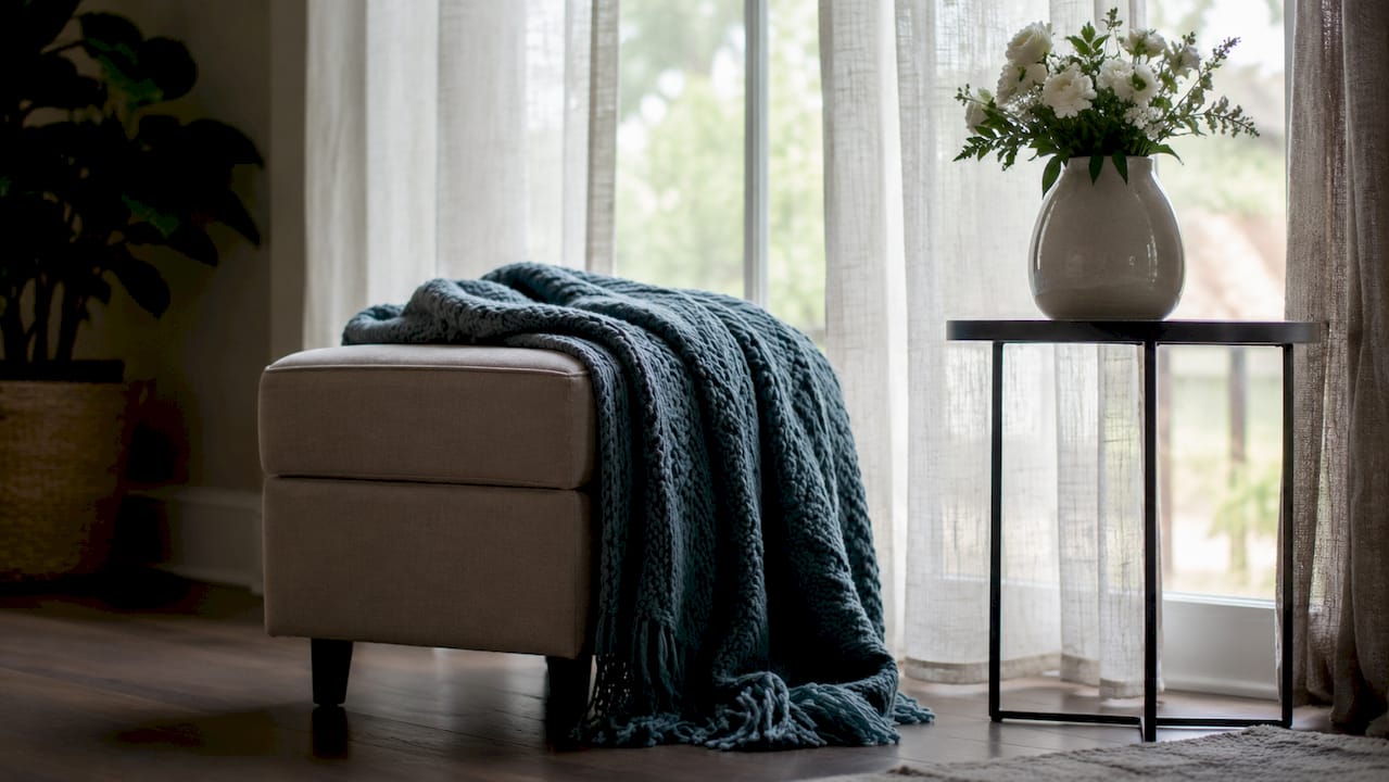 Layered soft furnishings enhancing home comfort ambiance