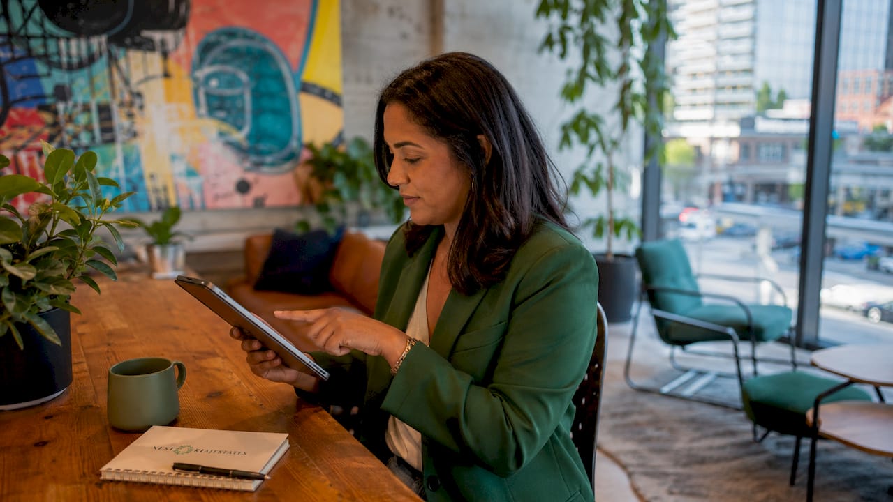 Property manager reviewing marketing tools at desk