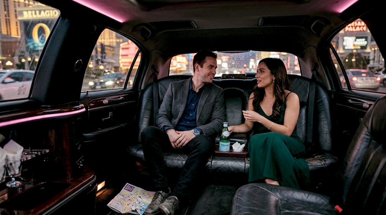 Couple celebrating in Vegas stretch limo