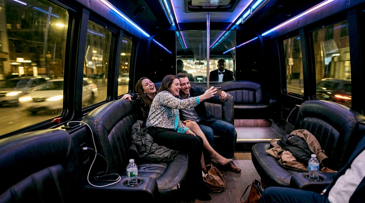 Friends celebrating inside Las Vegas party bus