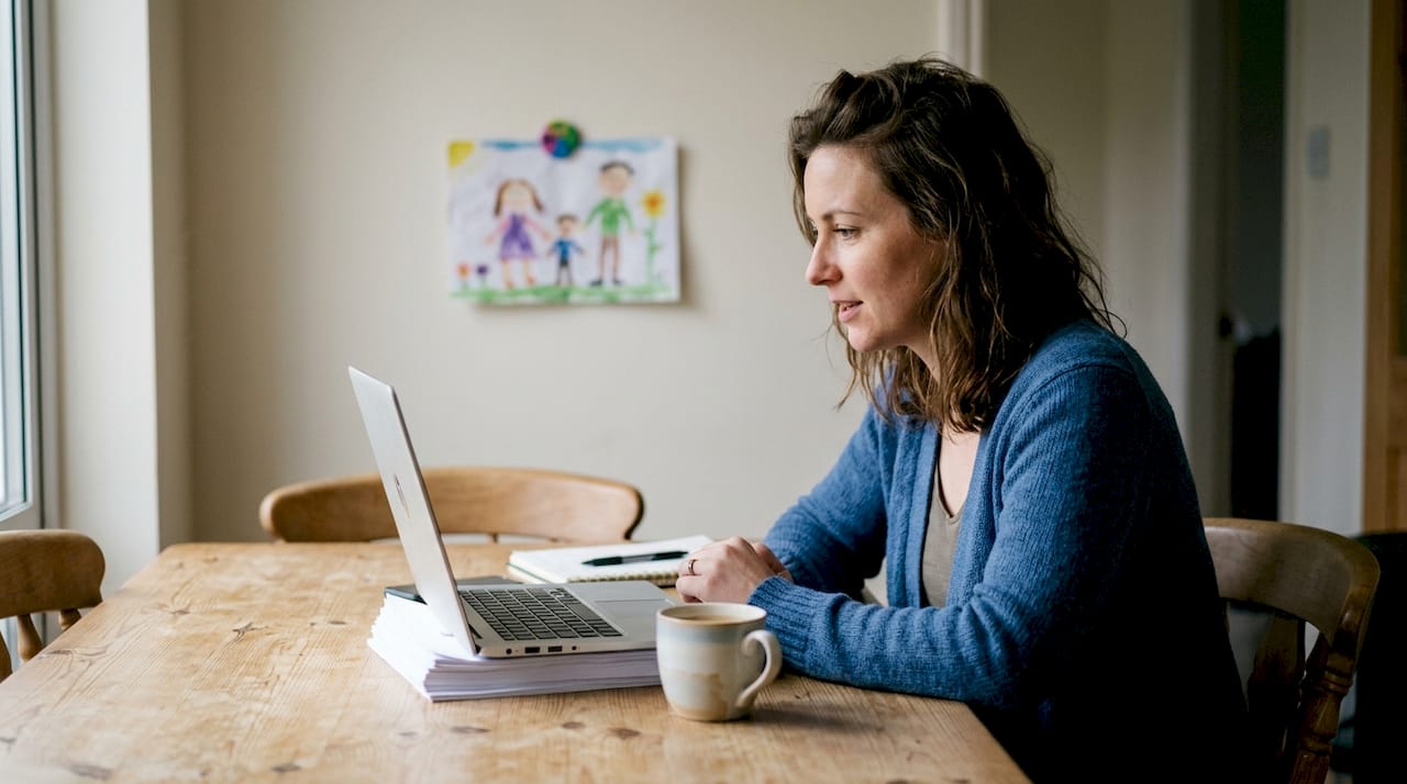 Woman in home office doing video interview