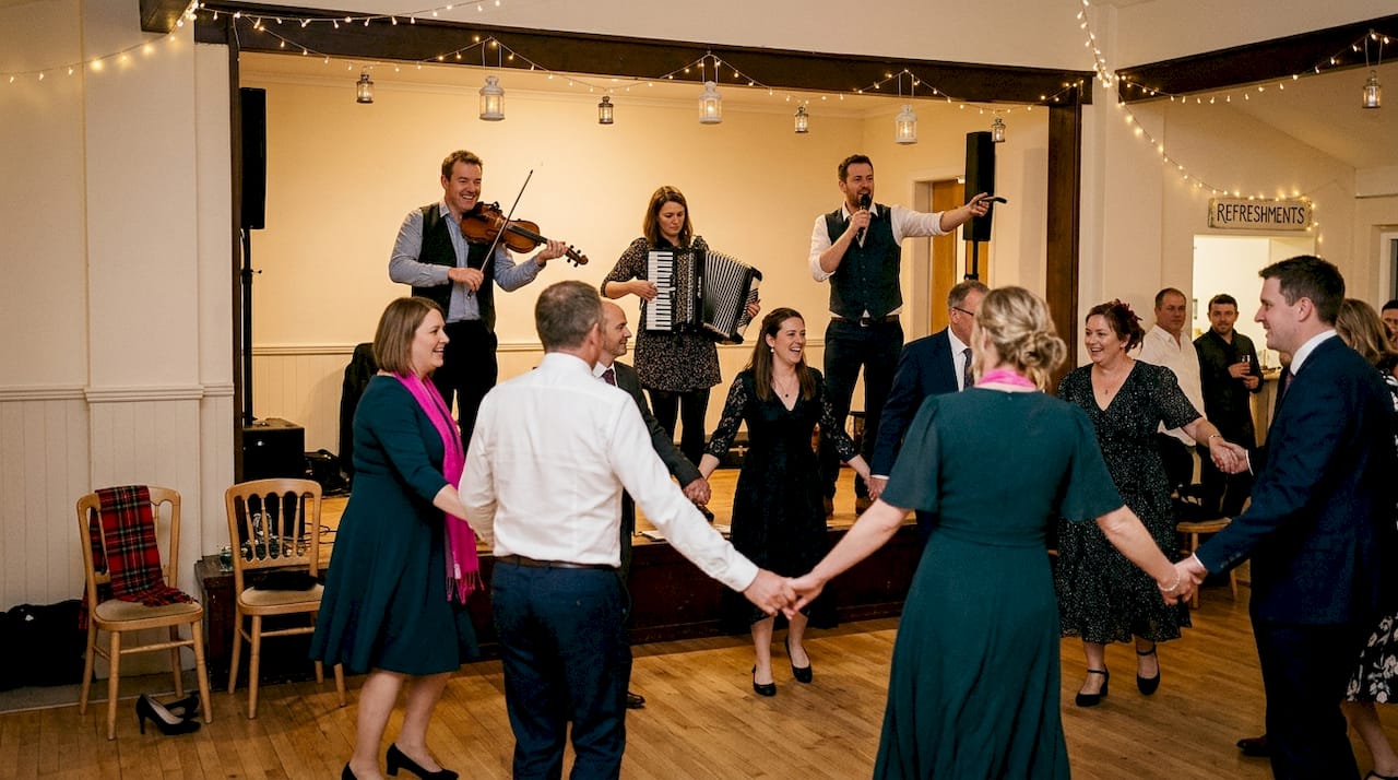 Ceilidh band playing for wedding guests