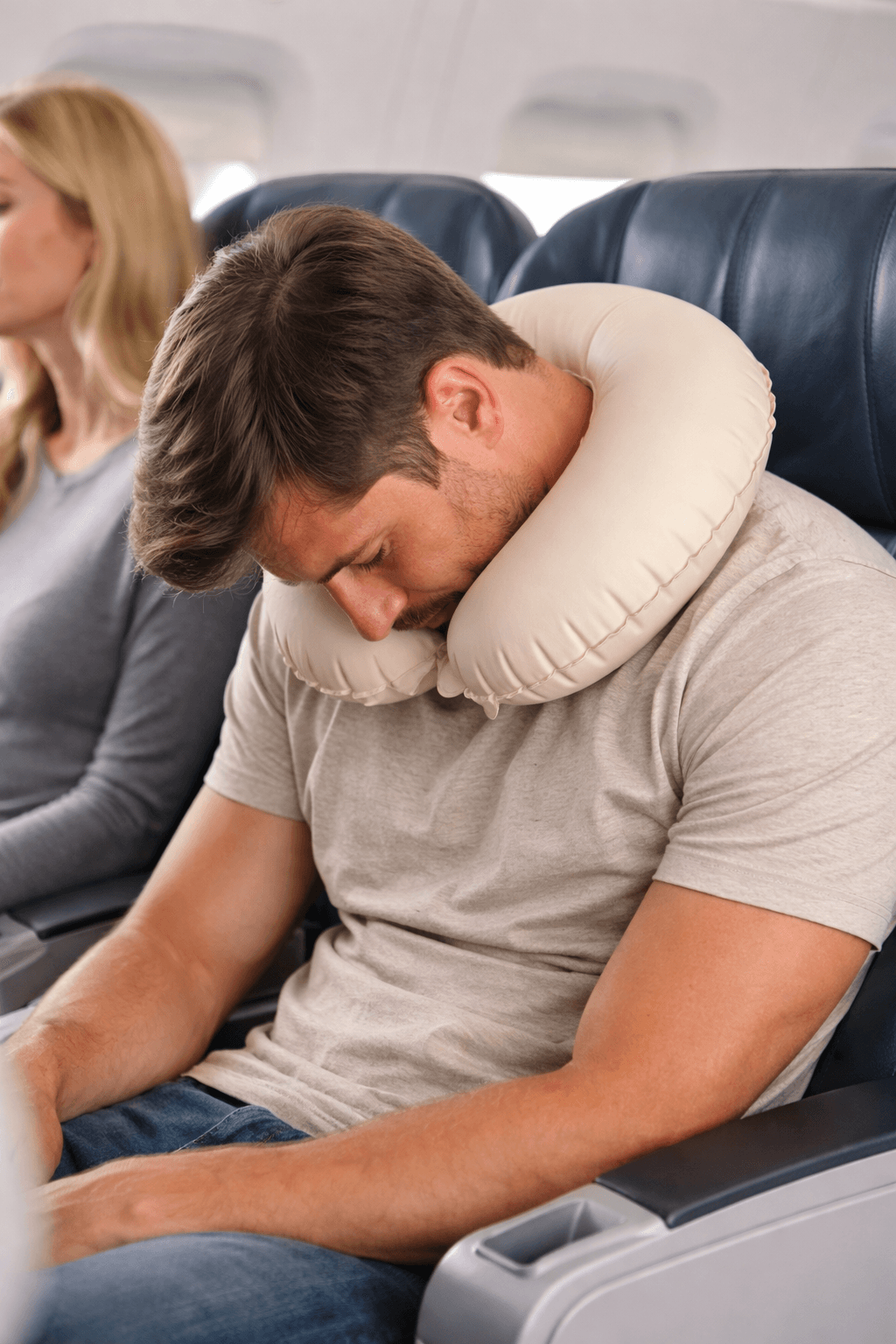 Inflatable pillow, scarf, and foam collar on train table