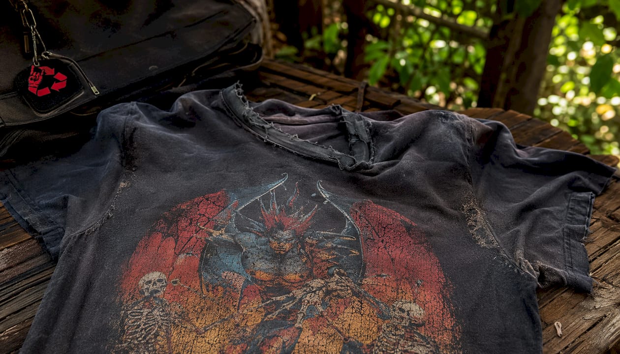 Close-up of worn collar and fabric distress on vintage shirt