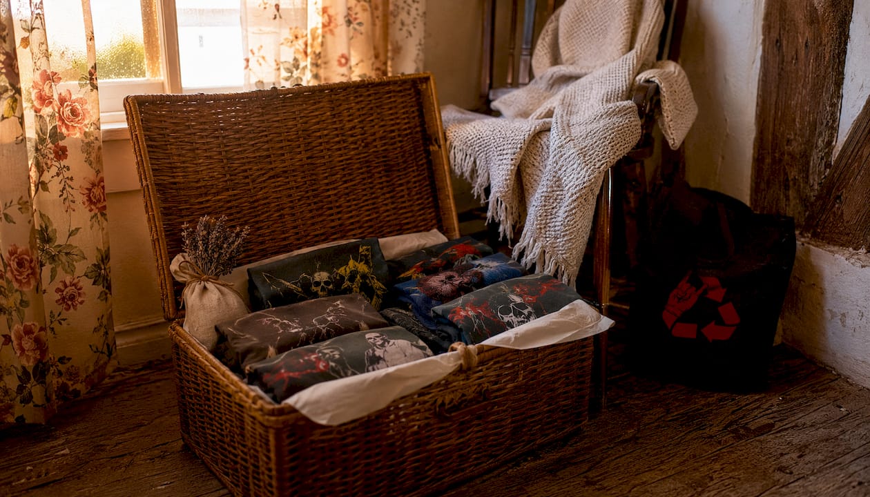 Overhead view of vintage band t-shirts stored with natural cedar and lavender