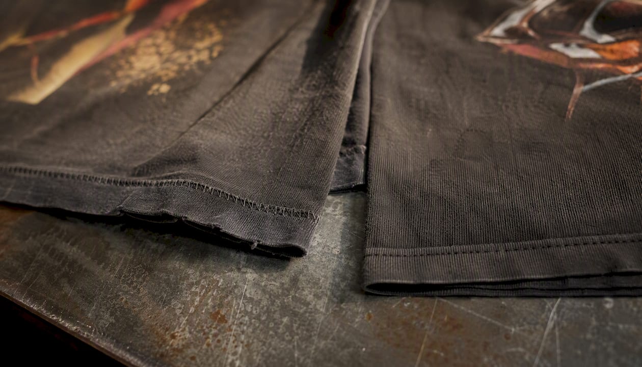 Close-up of single and double stitch on vintage t-shirts