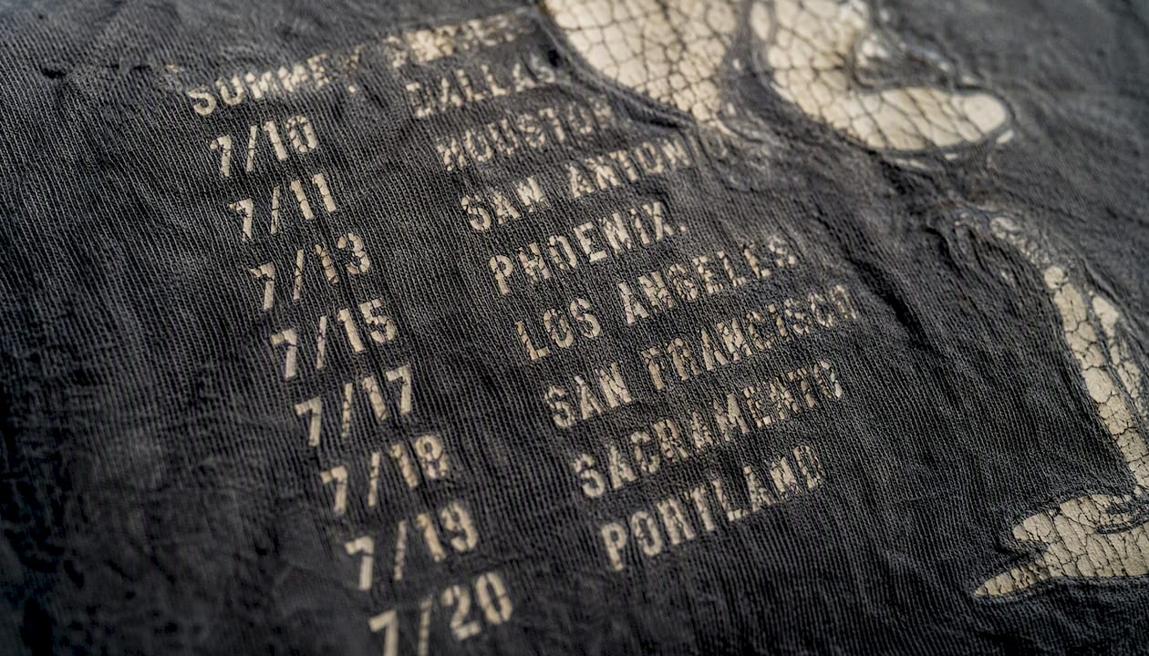 Worn tour date print on vintage metal shirt