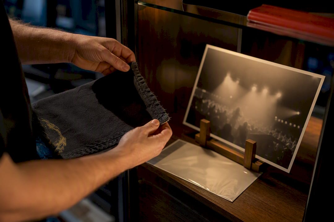 Tour photograph beside documented vintage garment provenance