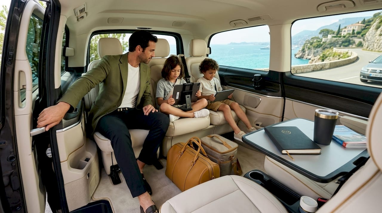 Family traveling comfortably inside passenger van