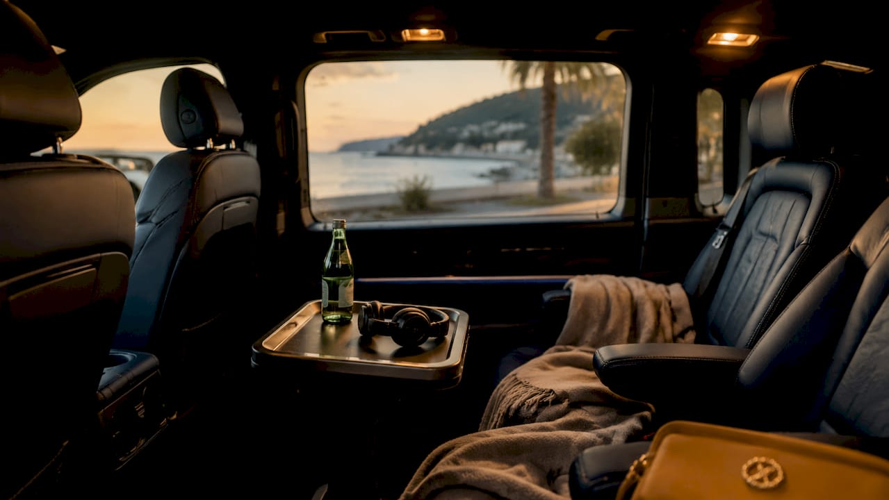 Interior of luxury VTC vehicle with amenities visible
