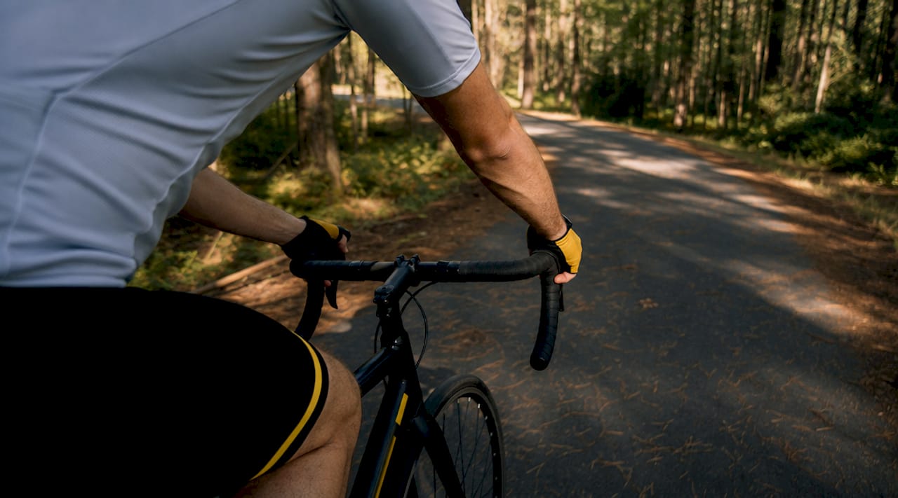 Cyclist hand signaling lane change