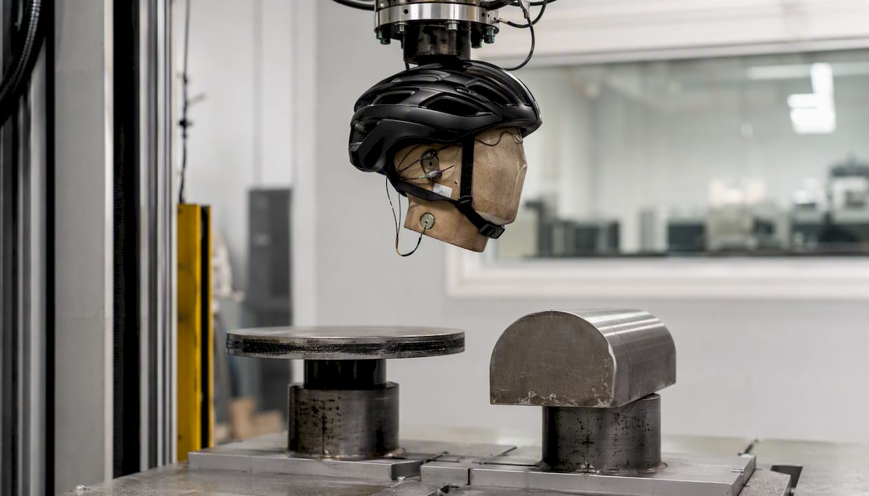 Helmet testing with flat and kerbstone anvils