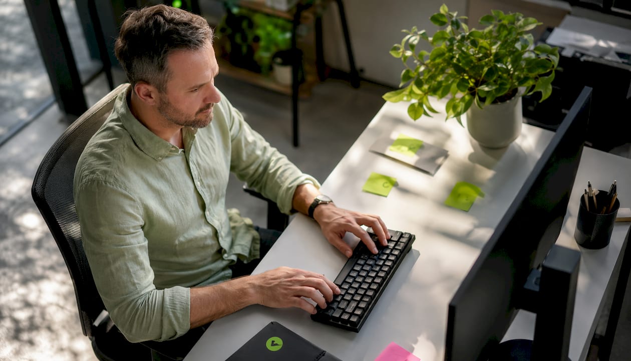 Hands typing during SEO technical audit session