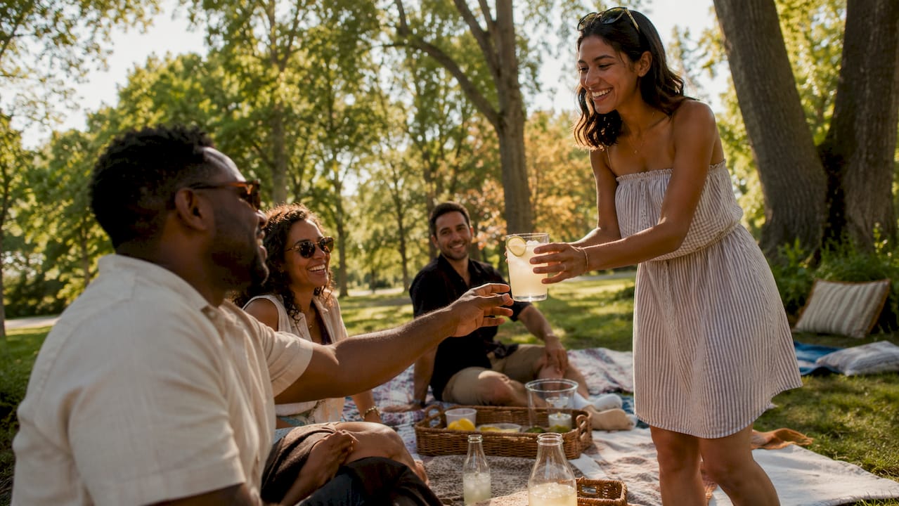 People socializing with chilled drinks outdoors