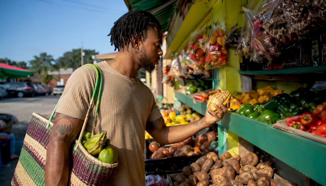 Customer shopping Caribbean foods in grocery store