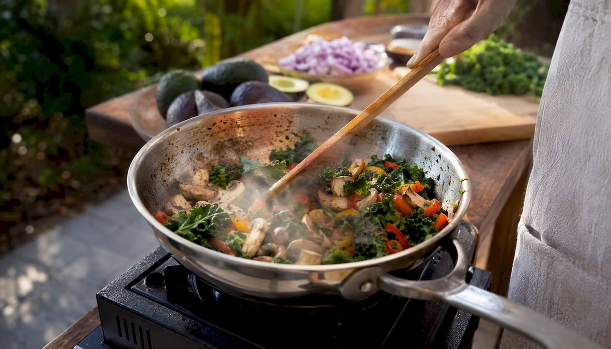 Vegetables cooking in skillet for breakfast