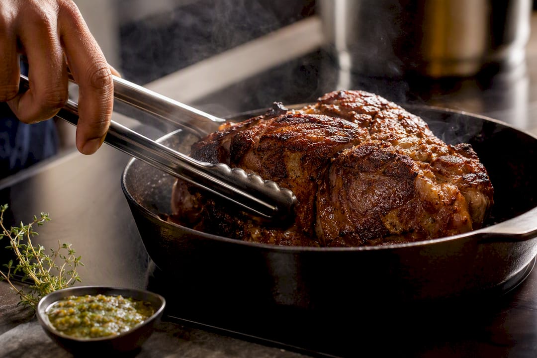 Pork shoulder searing in skillet