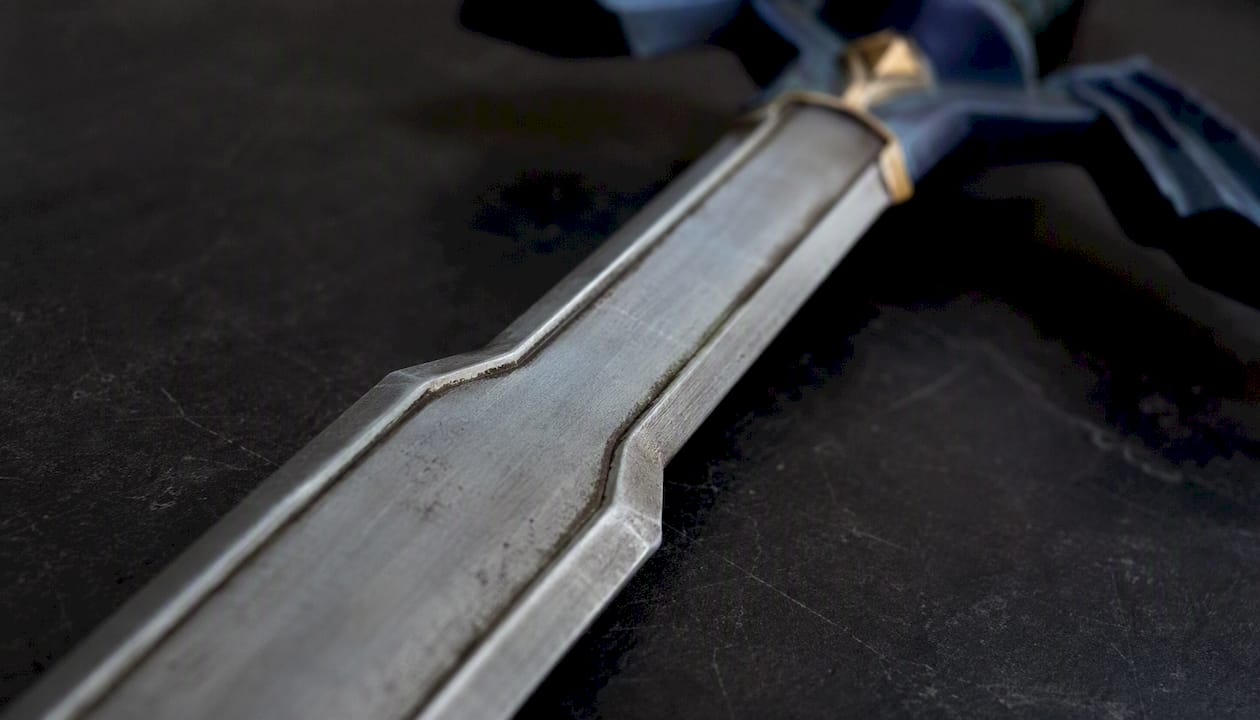 Weathered paint detail on cosplay sword blade edge