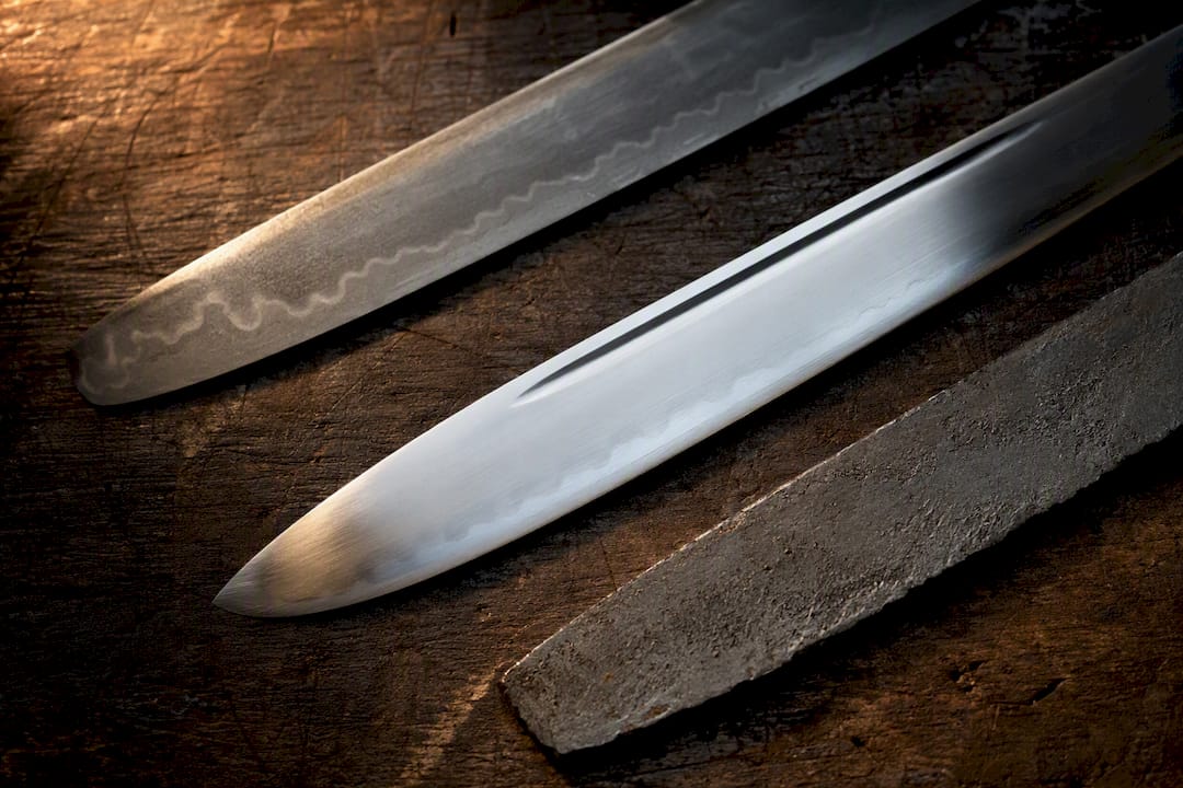 Close-up of steel sword blade finishes
