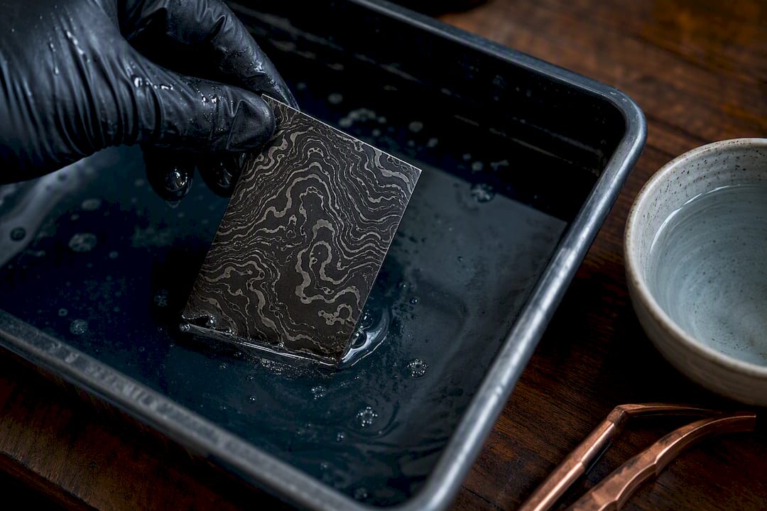 Etched steel coupon showing Damascus contrast