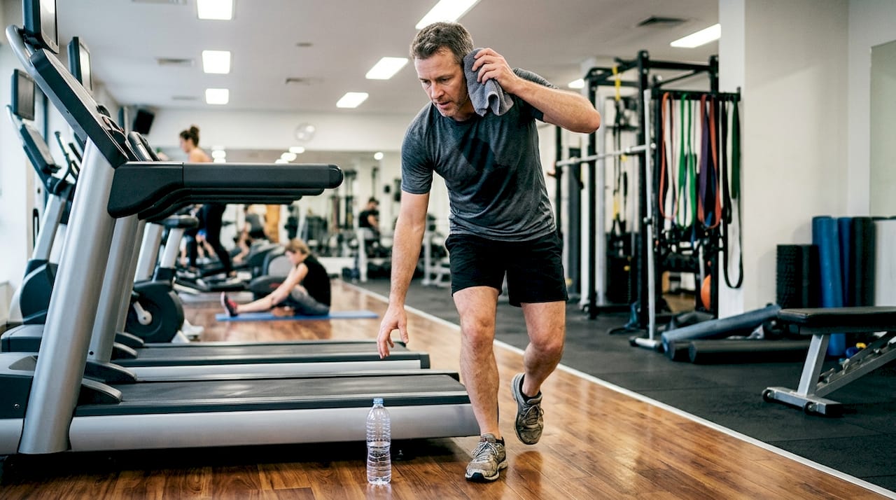 Athlete resting after treadmill workout