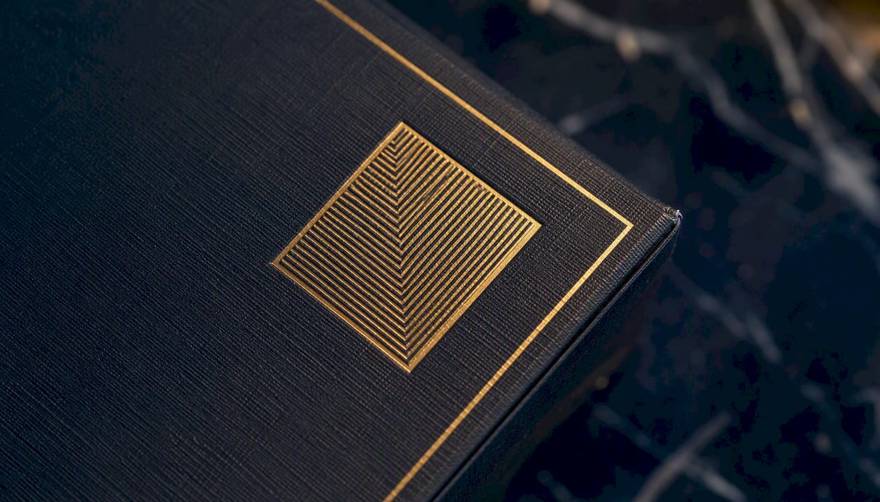 Close-up of sharp foil and embossing on perfume box