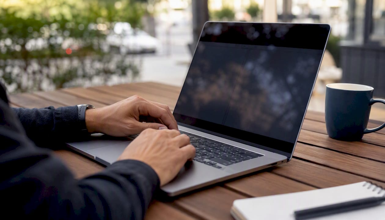 Hands comparing website source codes